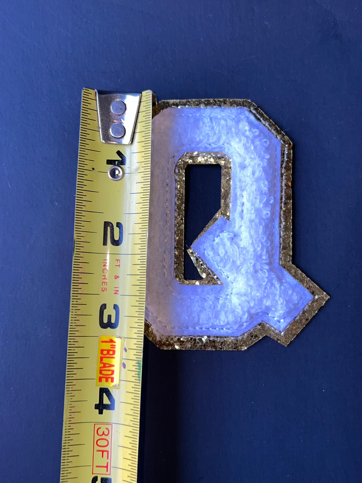 White and Gold Chenille Letter Q