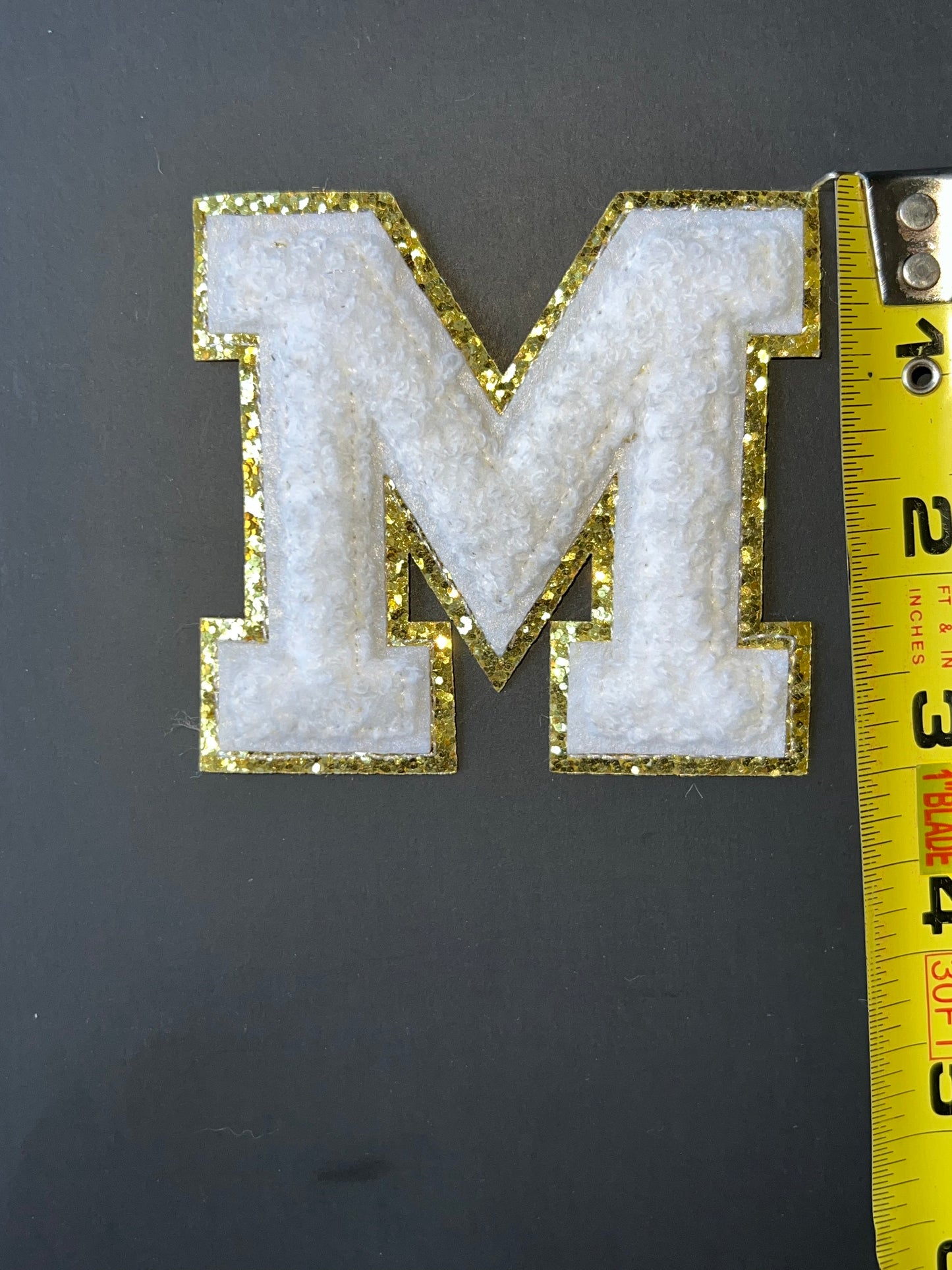 White and Gold Chenille Letter M